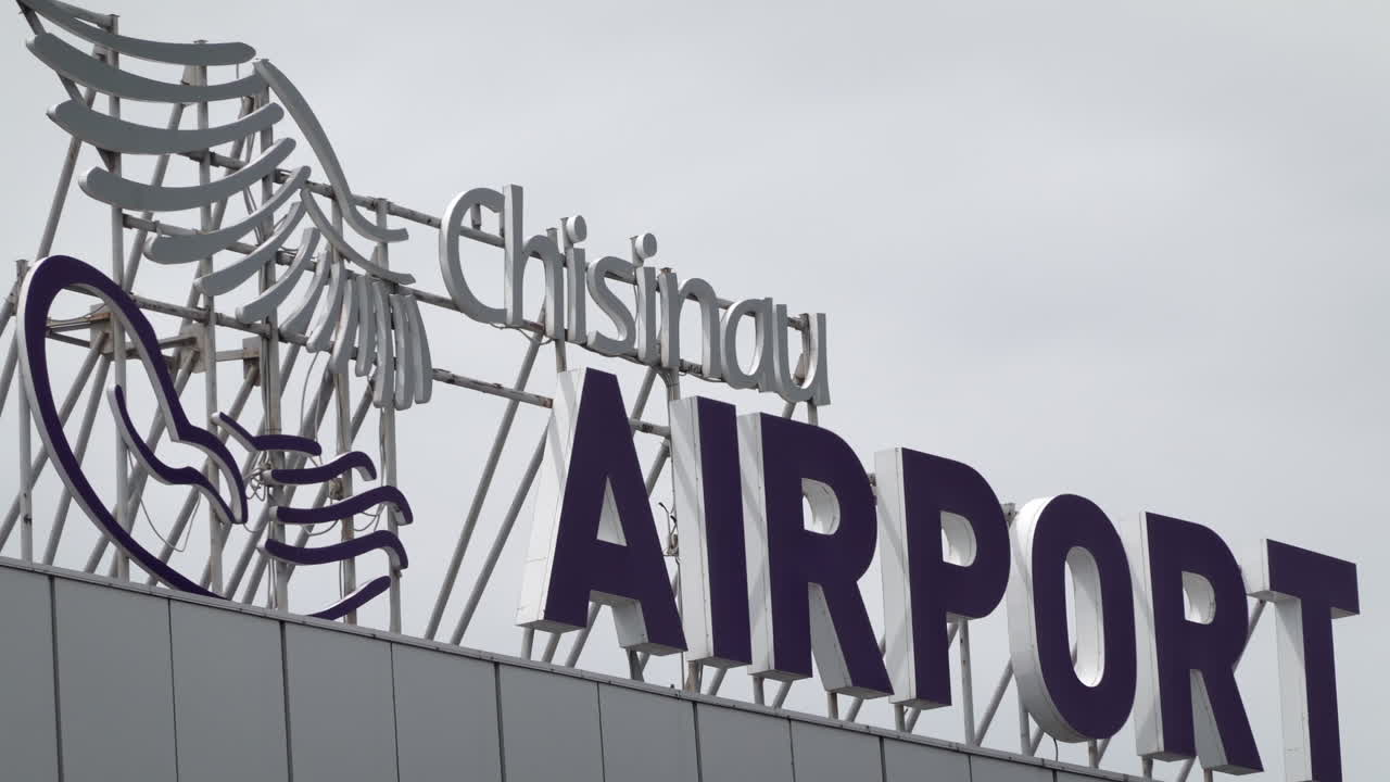 Chisinau airport signboard with the sky on the background