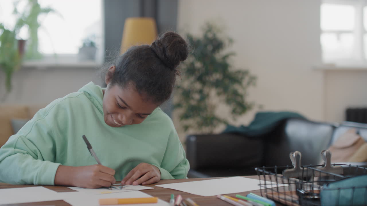 Smiling Afro Girl Drawing At Home