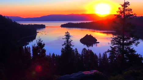 a beautiful sunrise establishing shot of emerald bay at lake tahoe