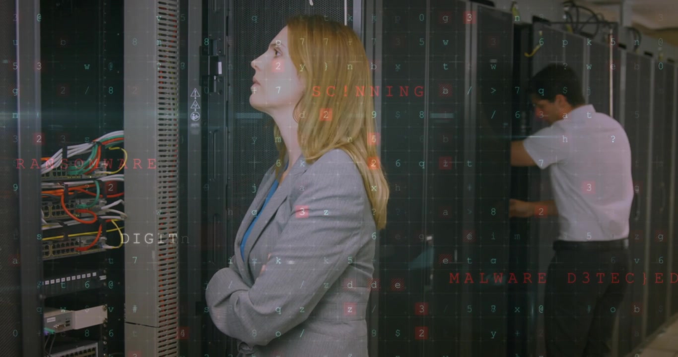 IT Professionals Monitoring Server Racks with Digital Security Overlay