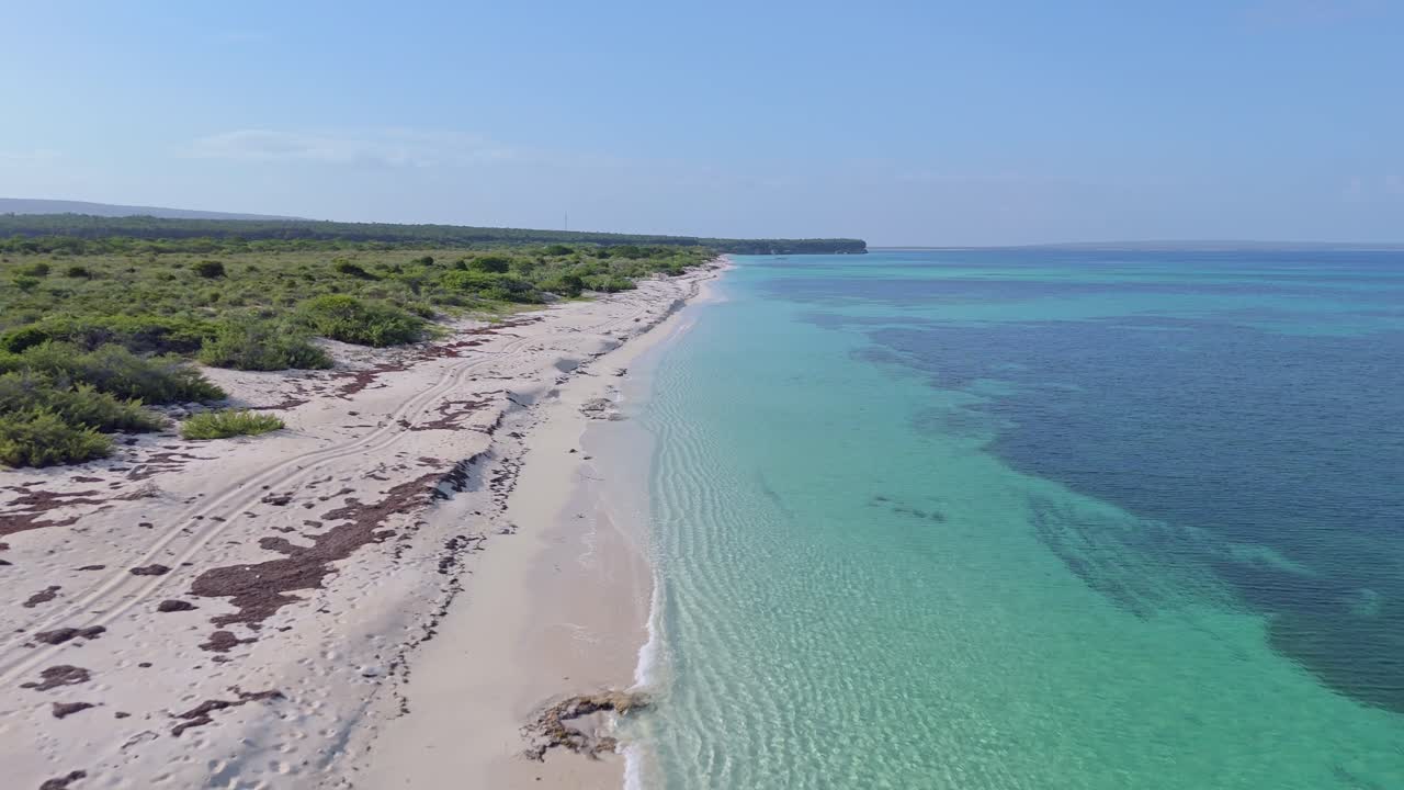 Aerial Birds Eye shot of playa la cueva with Caribbean Sea and green island of Dominican Republic