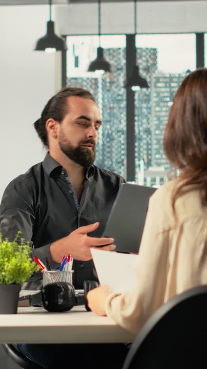 Vertical Video Professional workers focusing on performance metrics and data visualization