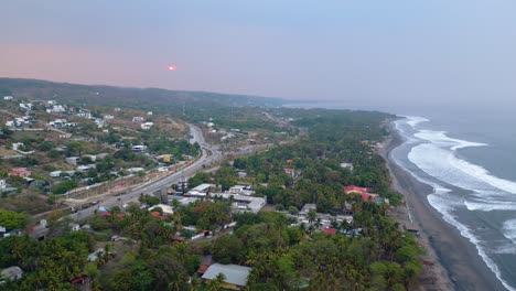 aerial view of coastal town at sunrise