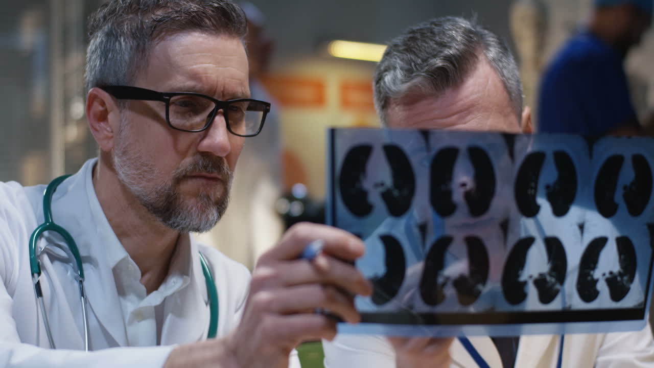 Doctors Reviewing Chest X-Rays