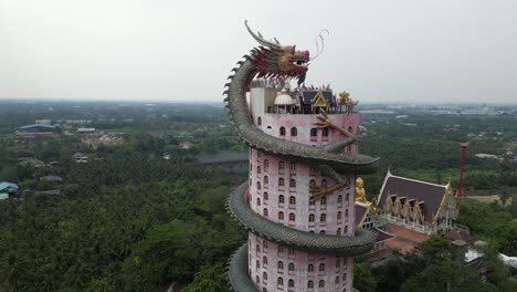 aerial drone view of buddhist dragon temple, wat sam phran near bangkok thailand