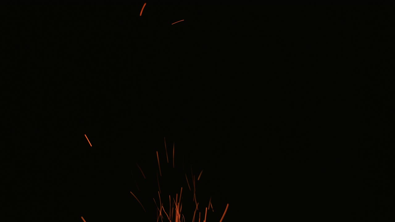 las chispas de fuego, el fondo, el oro, las chispas, el naranja negro.