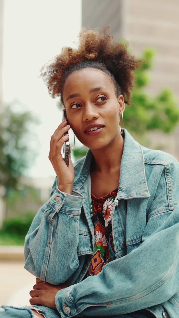 Woman talking on the phone outdoors