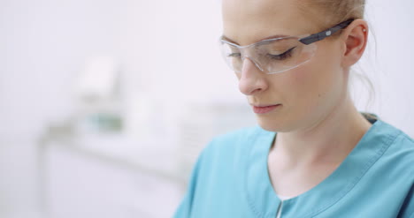 female doctor looking for medical instrument