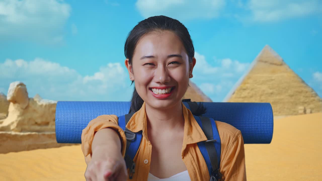 Happy Traveler Pointing at the Pyramids