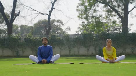 Indian-couple-doing-butterfly-yoga-pose