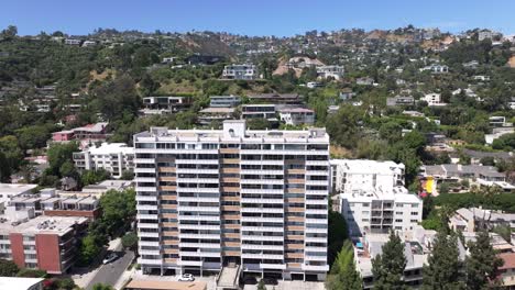 High-end-homes,-apartments,-and-condos-in-Hollywood-Hills-West-near-Sunset-Boulevard---aerial-parallax