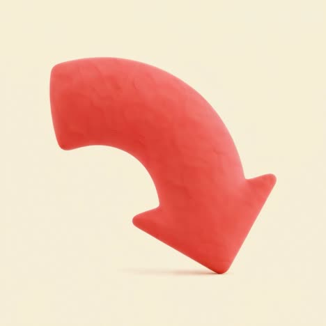 red clay arrow pointing downwards