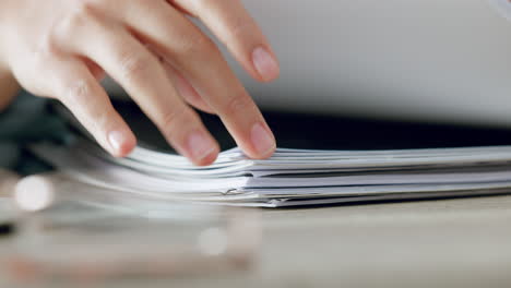 Zoom-of-woman-hands,-organise-paper