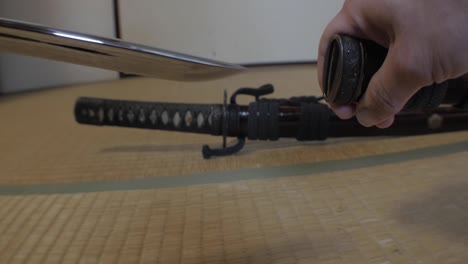 samurai swords being drawn on tatami