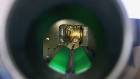 mechanism inside of reverse vending bottle recycling machine.