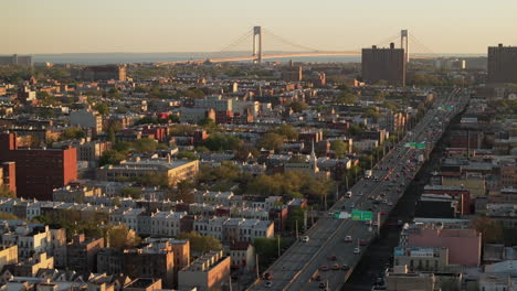 shot in bay ridge, brooklyn at sunset with rush hour traffic on the belt parkway