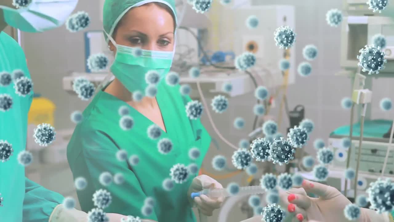 animación de las células del virus covid-19 sobre los cirujanos en el quirófano