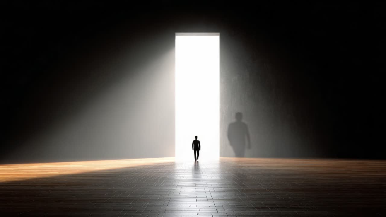 A solitary figure stands before a vast, illuminated doorway, symbolizing hope, opportunity, and the journey towards new beginnings in an otherwise dark environment