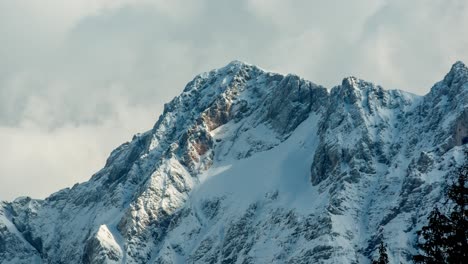 A-pan-shot-of-snow-mountain-with-sunlight-shining-on