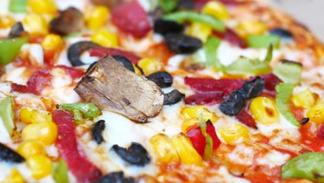 close-up of a pizza with various toppings