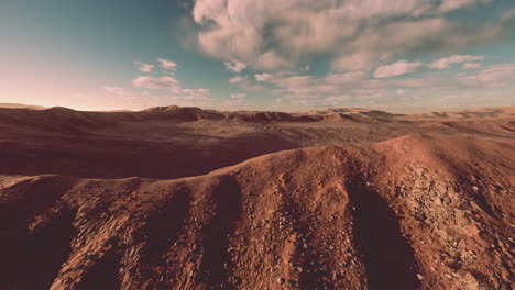 sunset over the sand dunes in the desert