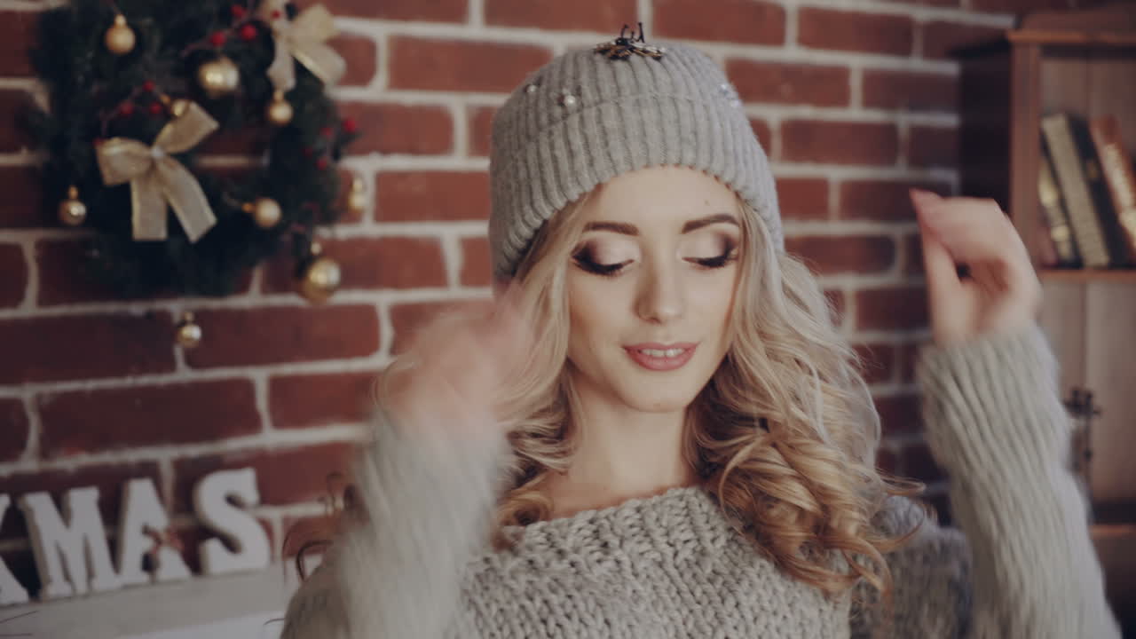Portrait of Christmas woman. Christmas portrait of young woman in New Year interior