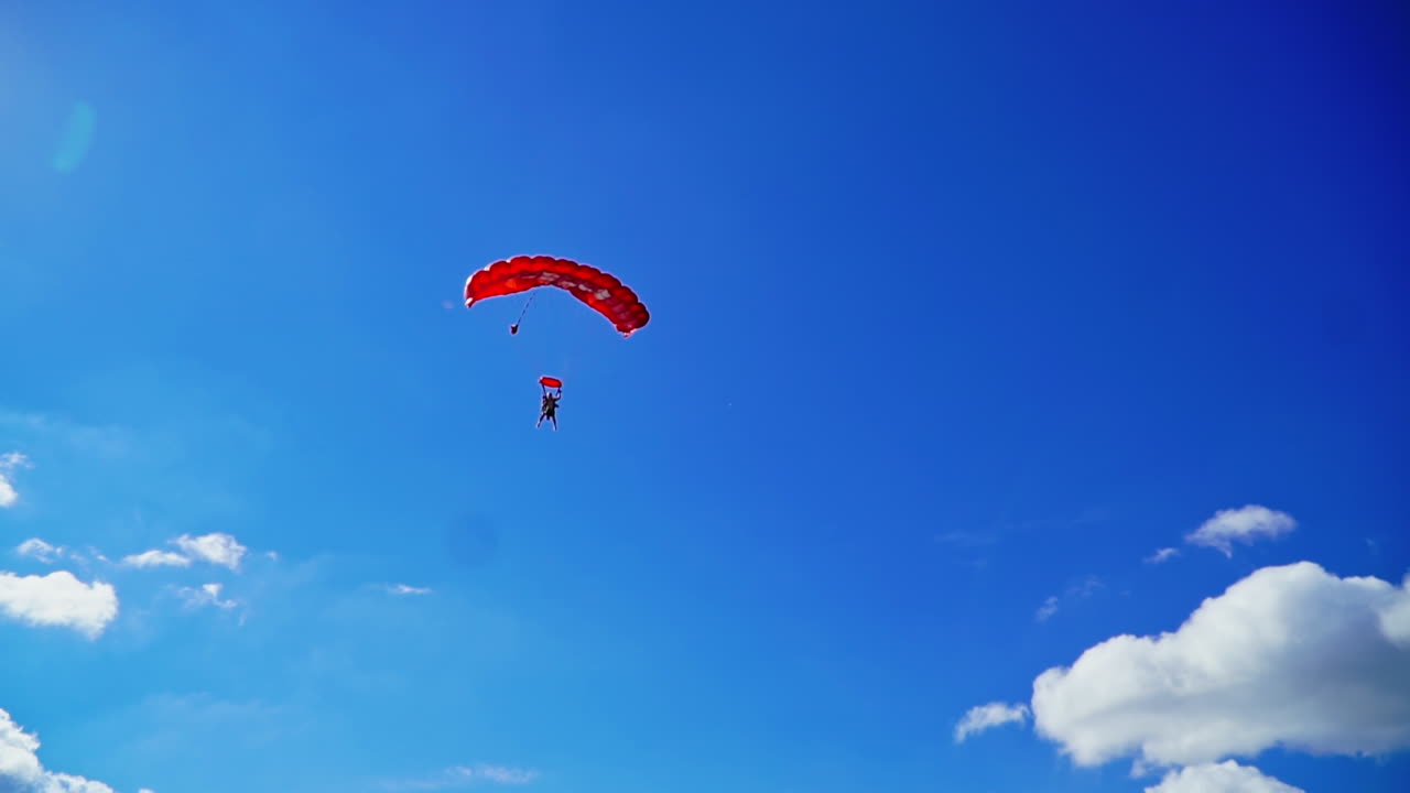 Skydiving with Red Parachute