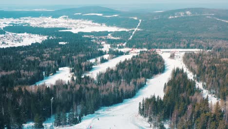 aerial view of a snowy ski resort with a village