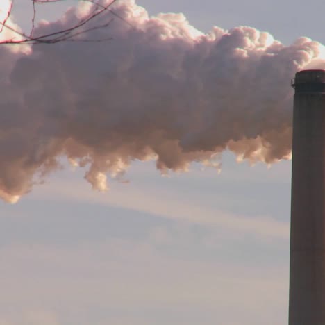 A-power-plant-with-smokestacks-belches-smoke-into-the-air