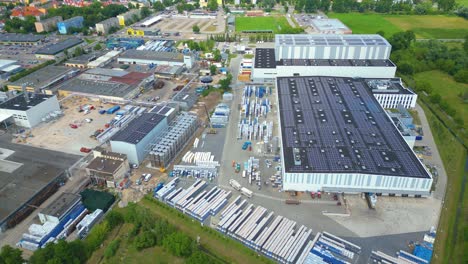 Aerial-view-of-modern-storage-warehouse-with-solar-panels-on-the-roof