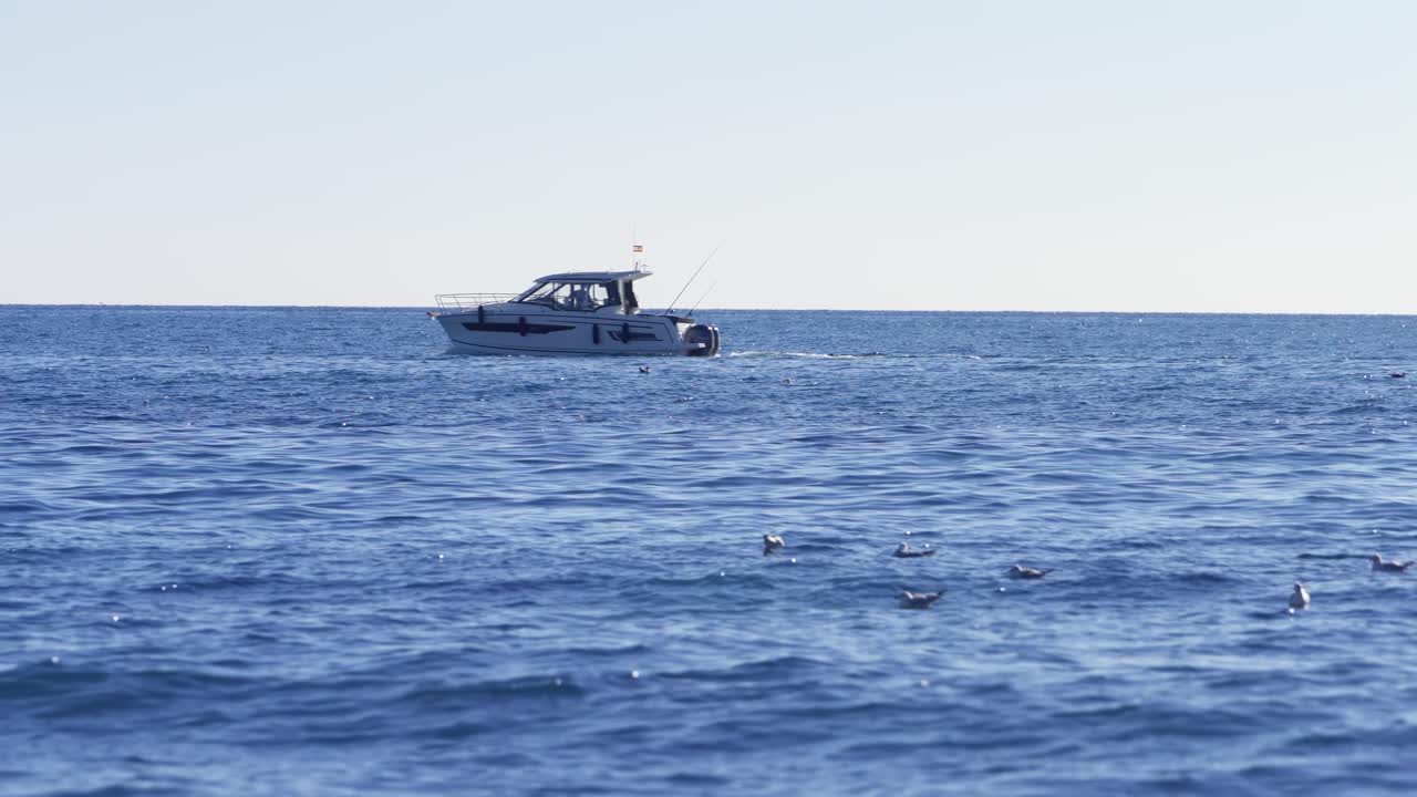 Motorboat passing by on the Mediterranean Sea