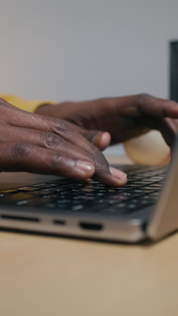 Person typing on a laptop
