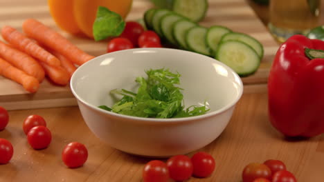 salad being prepared on table