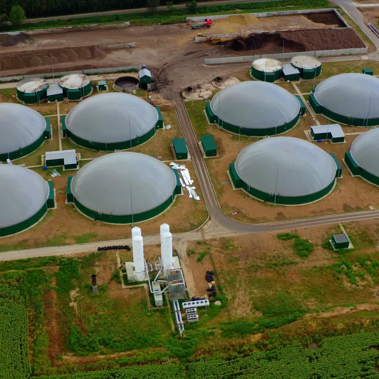 Sustainable production of biofuel. Bio gas factory. Modern plant. Aerial view on the modern biofuel factory. Video from above.
