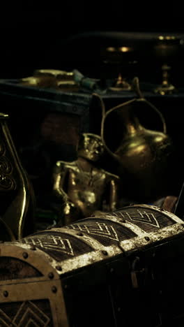 a treasure chest filled with gold artifacts