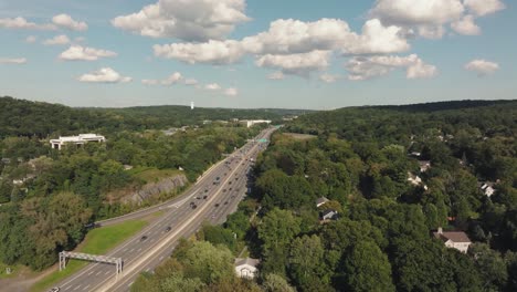 cinematic 4k aerial shot of american highway summer blue sky