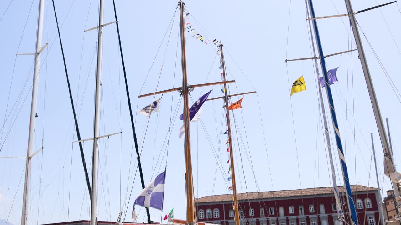 Colorful flags waving on a ship's mast