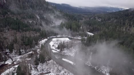 breath-taking drone footage of mountains. flying through clouds