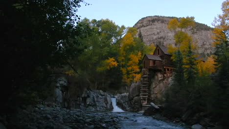 Colorado-Crystal-Mill-historic-landmark-waterfall-Crystal-River-Marble-sunset-autumn-fall-aerial-drone-cinematic-golden-hour-Carbondale-Telluride-Aspen-Pitkin-Gunnison-county-slide-right-slowly-motion