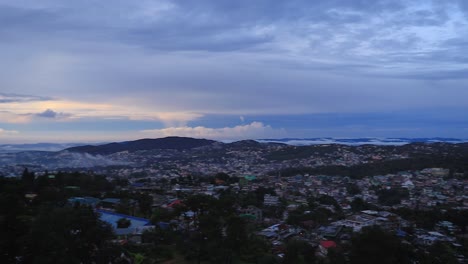 downtown city view with dramatic cloudy sky at evening from mountain top video is taken at shillong meghalaya india