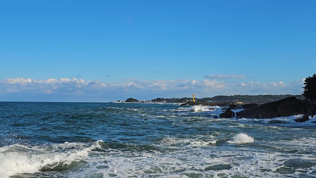 Ocean Waves Crashing on Rocky Coast