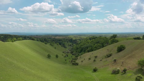 aerial shot trucking along above rolling hills of the deliblatska peščara in serbia