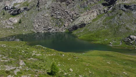 pureness of mountain lake water in summer season in valmalenco of valtellina region in northern italy