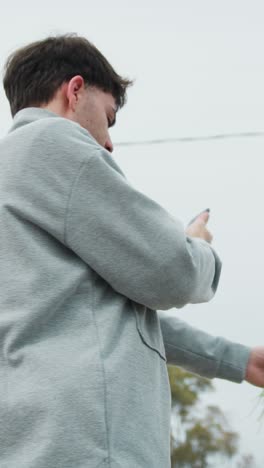 man doing a picture of the flowers he picked for valentines day