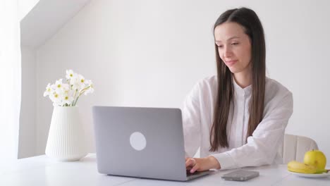 business woman boss sitting tired with laptop finishing work staying long hours in corporate office business woman boss sitting tired with laptop finishing work staying long hours in corporate office workspace corporate person at work