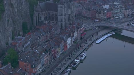 Tilt-up-shot-of-Citadel-of-Dinant-at-meuse-river,-aerial