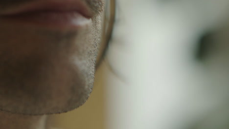 close-up of a man's face with mustache