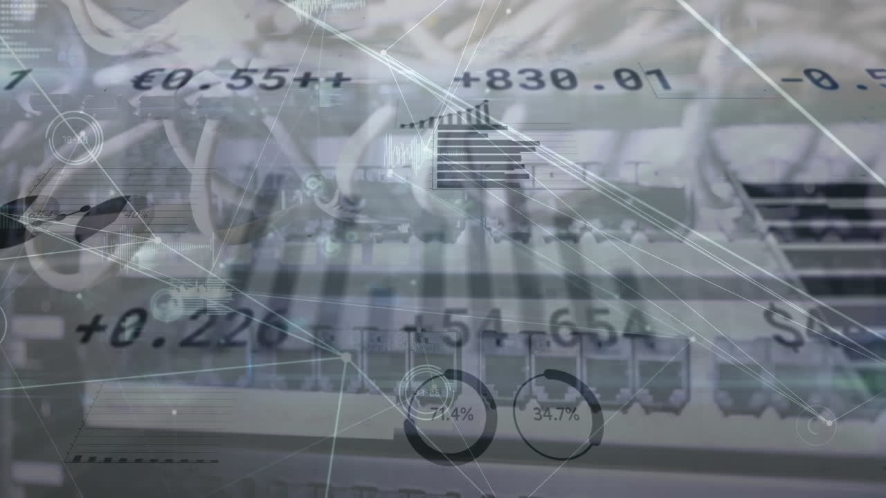 컴퓨터에 연결된 케이블을 통해 통화 기호와 숫자를 가진 여러 그래프의 애니메이션