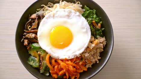 bibimbap, korean spicy salad with rice bowl - traditionally korean food style