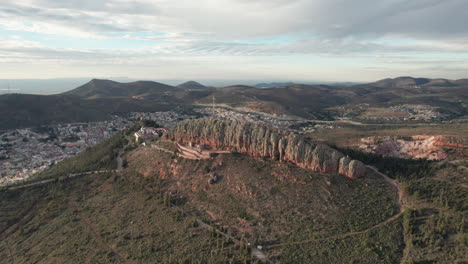 discover the iconic cerro de la bufa in zacatecas from a unique perspective as our drone approaches and flies over this emblematic landscape